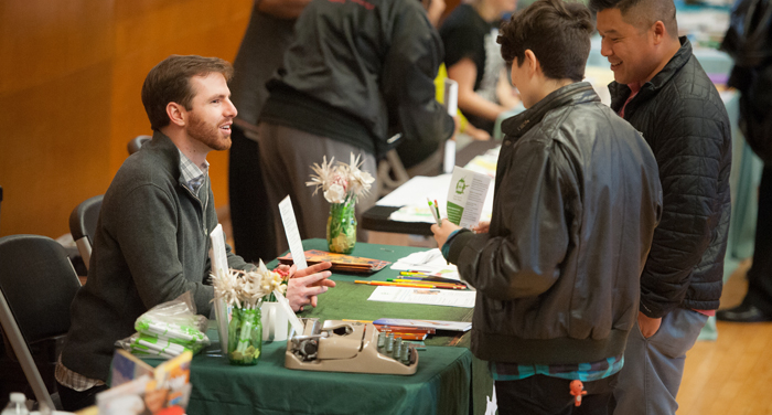 an image of two young girls working together in a library